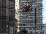 Spider building sun